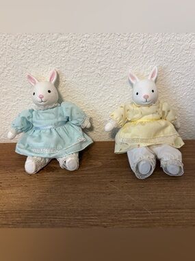 Pair of Russ Berrie porcelain bunny figurines. Light Blue and Pale Yellow